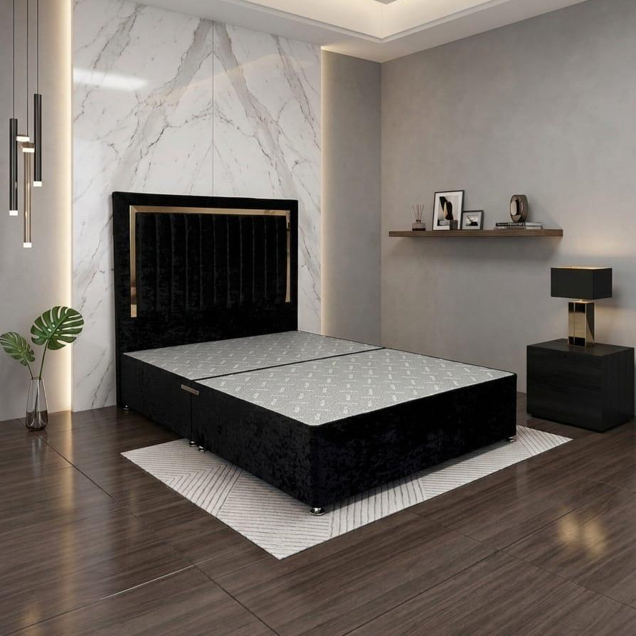Modern bedroom with a black bed and marble wall