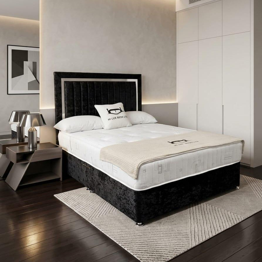Modern bedroom with a bed, nightstands, and wall art.